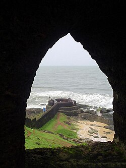 Observation post arch inside Bekal Fort looking out onto the ocean